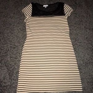 Very cute black and cream colored dress.